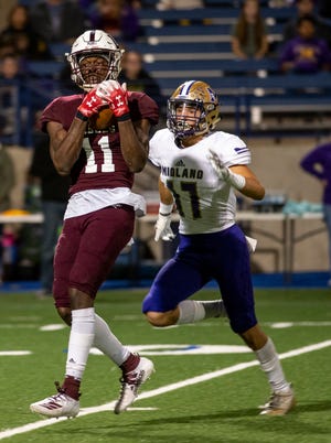 Midland Lee wide receiver Loic Fouonji (11) made an oral commitment Monday to Texas Tech. Fouonji has caught 68 passes for 1,425 yards and 22 touchdowns this season. [JACY LEWIS/MIDLAND REPORTER-TELEGRAM]