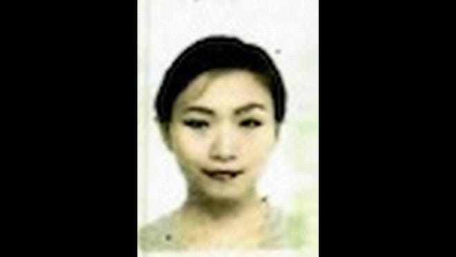 Yujing Zhang from her passport photo. (Miami Herald/TNS)