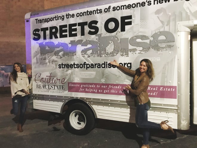Cathy Bryant, of Streets of Paradise, with truck donated by Allison Werner, of Couture Real Estate, right. [CONTRIBUTED PHOTO / MOLLY RUSSO]