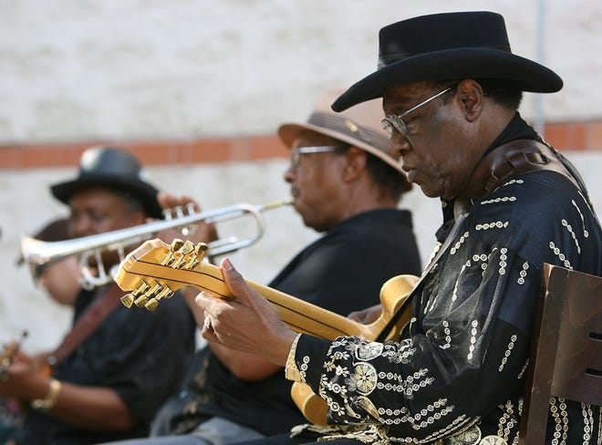 Henry "Blues Boy" Hubbard, right, seen here with members of the Eastside Kings band in 2006, died Saturday at age 85. [American-Statesman File]