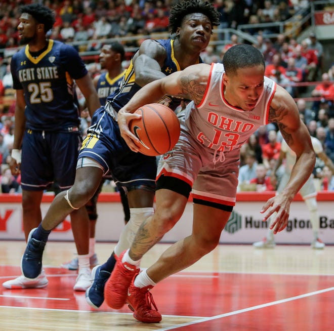 Ohio State Buckeyes guard CJ Walker (13) reacts to being pushed out of bounds by Kent State Golden Flashes guard Antonio Williams (4) during the first half of the game between the Ohio State Buckeyes and the Kent State Golden Flashes at St. John Arena in Columbus, Ohio on Monday, Nov. 25, 2019. [Maddie Schroeder]