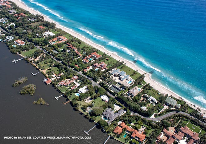 This stretch of Palm Beach’s South Ocean Boulevard, known to locals as Billionaires Row, is lined with estates that generate some of the highest residential property-tax bills in town, according to a Palm Beach Daily News analysis of the new 2019 tax rolls. Seven estate owners saw a levy of $1 million or more in property taxes this year — one more than last year. In all, just under 60 Palm Beach owners will face bills totaling $500,000 or more. [Photo by Brian Lee, courtesy WoollyMammothPhoto.com]