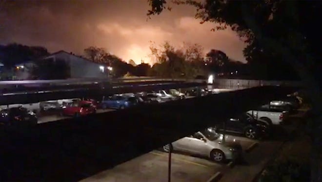 Smoke and fire fill the sky from a massive explosion at a Texas chemical plant on Wednesday in Port Neches, Texas. The fire continued to burn Wednesday morning at the TPC Group plant, after the blast sent a large plume of smoke that stretched for miles. All employees have been accounted for, TPC said in confirming that there were injuries. [KFDM-TV via AP]