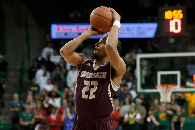 Texas State guard Nijal Pearson (22) attempts a shot during the Bobcats’ game against Baylor in Waco on Nov. 15. [TONY GUTIEEREZ/THE ASSOCIATED PRESS]
