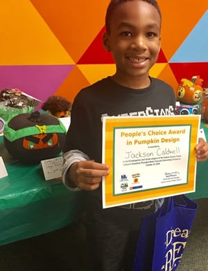 People’s Choice Award winner in the K-2nd grade category of the Gaston County Public Library’s Somethin Pumpkin Decorating Contest is Jackson Caldwell. His pumpkin was decorated as Lloyd from the Lego Ninjago series. [PHOTO BY BRANDY CALDWELL]