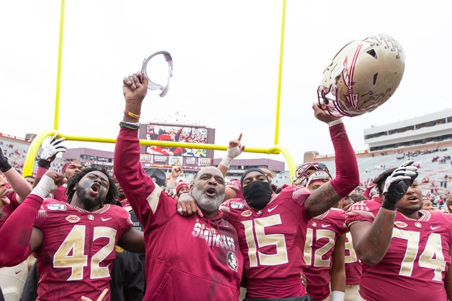 Florida State interim head coach Odell Haggins celebrates his team's 49-12 victory over Alabama State in an NCAA college football game in Tallahassee, Fla., Saturday, Nov. 16, 2019. (AP Photo/Mark Wallheiser)