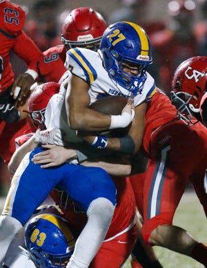 Piedmont's Davontae Pickard (27) carries the ball during a 5A semifinal high school football game between Carl Albert and Piedmont at Western Heights in Oklahoma City, Friday, Nov. 29, 2019. [Nate Billings/The Oklahoman]