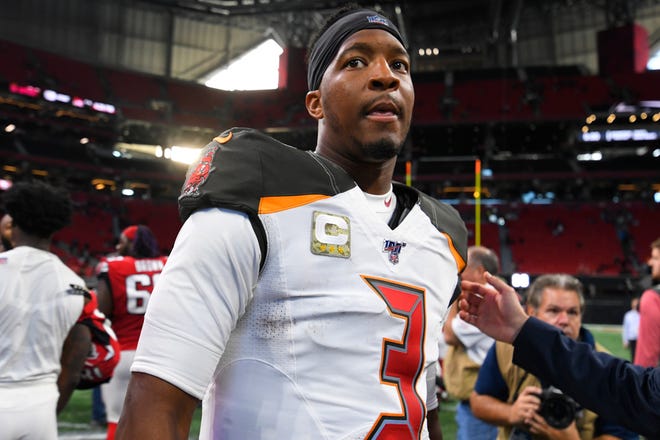 Tampa Bay Buccaneers quarterback Jameis Winston leaves the field after defeating the Atlanta Falcons on Sunday in Atlanta. The Buccaneers visit the Jaguars on Sunday. [John Amis/The Associated Press]