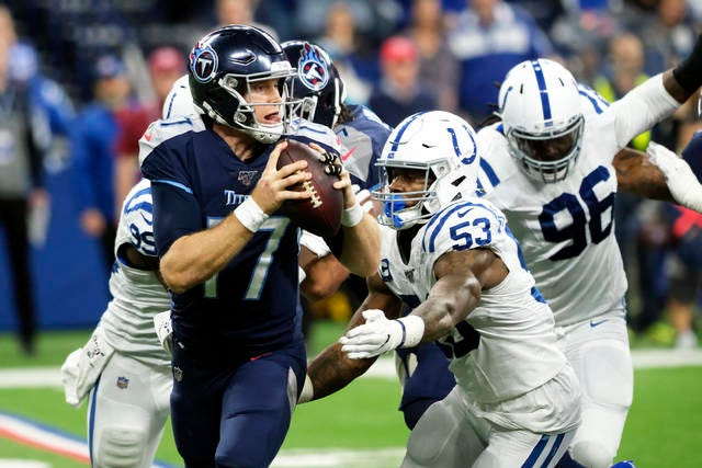 Indianapolis Colts defensive end Ben Banogu (52) sacks Tennessee Titans quarterback Ryan Tannehill (17) during the first half of an NFL football game in Indianapolis, Sunday, Dec. 1, 2019. (AP Photo/AJ Mast)