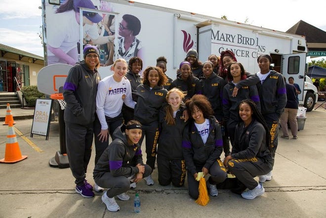 (L-R) Head Coach Nikki Fargas and the LSU Women's Basketball attended the third annual Live Well Ascension event that brought a multitude of cancer prevention, education and early detection services in a convenient location with family-friendly activities.