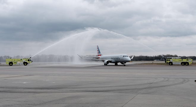 The American Airlines inaugural flight from Dallas Fort Worth was greeted with water spray from fire trucks from Augusta Regional Airport the fire trucks at the Augusta Regional Airport in Augusta, GA. on Sunday, March 3, 2018. [MIKE ADAMS/SPECIAL]