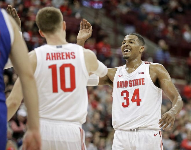 Ohio State Buckeyes forward Kaleb Wesson (34) is congratulated by forward Justin Ahrens (10) after drawing a foul during the first half of Sunday's NCAA basketball game against the UMass Lowell River Hawks at Value City Arena in Columbus on November 10, 2019. Ohio State won the game 76-56. [Barbara J. Perenic]