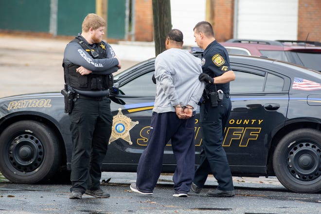 A man was taken into custody following a brief vehicle chase Sunday. [SCOTT PELKEY / SPECIAL TO THE COURIER-TRIBUNE]
