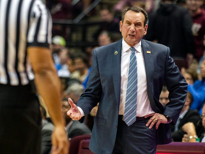 Duke head coach Mike Krzyzewski talks with a referee during a game against Florida State in Tallahassee, Florida on Jan. 12. Duke plays Michigan State on Tuesday night. [MARK WALLHEISER/AP FILE PHOTO]