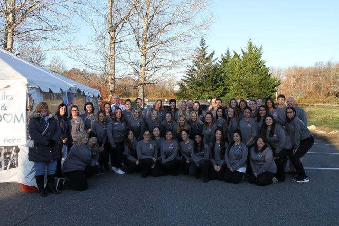 Aiding 45 local military and first responders, a team from Perfect Smiles Dentistry in Westport donated more than $50,000 in free dental care on Nov. 9. [CONTRIBUTED PHOTO]