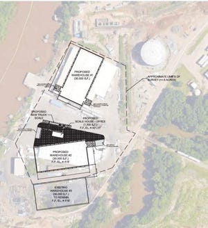 Two new bulk storage warehouses and a scale house will be built at the Port of Fort Smith with insurance money and grant funding from the Arkansas Waterways Commission. Studio 6 Architects of Fort Smith has been approved by the Fort Smith Port Authority to design the buildings. Insurance money is set to be allocated by the Fort Smith Board of Directors on Tuesday. [Courtesy Studio 6 Architects]