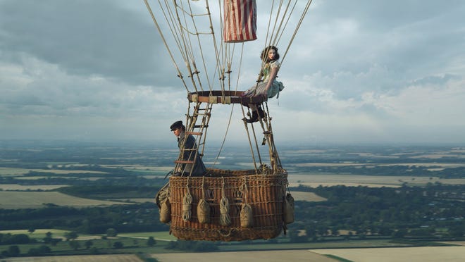 Eddie Redmayne and Felicity Jones enjoy a rare moment of calm way up in the sky. [Amazon Studios]