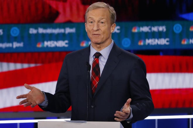 FILE - In this Nov. 20, 2019, file photo, Democratic presidential candidate investor Tom Steyer speaks during a Democratic presidential primary debate in Atlanta. Democrats are narrowing Donald Trump's early spending advantage, with two billionaire White House hopefuls joining established party groups to target the president in key battleground states that are likely to determine the outcome of next year's election. (AP Photo/John Bazemore, File)