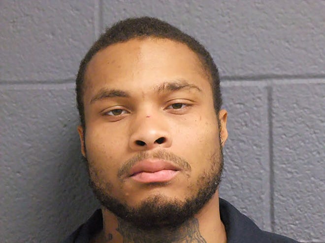 In this Nov. 25, 2019 photo provided by the State of Michigan Department of Corrections is JuJuan Parks. Parks, a convicted felon has been charged in the fatal shooting last month of a Detroit police officer Rasheen McClain and the wounding of another as they searched for him following a home invasion. Parks could be arraigned as early as Tuesday, Dec. 3 on 16 charges, including first-degree premeditated murder. (State of Michigan Department of Corrections via AP)