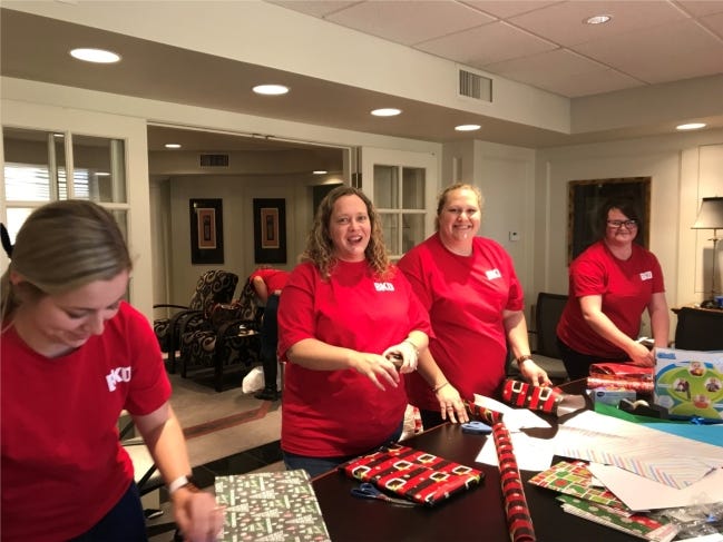 Repeat winner BKD CPAs & Advisors claimed the No. 17 spot among midsize employees. Here, Enid employees volunteer for Christmas. [PROVIDED]