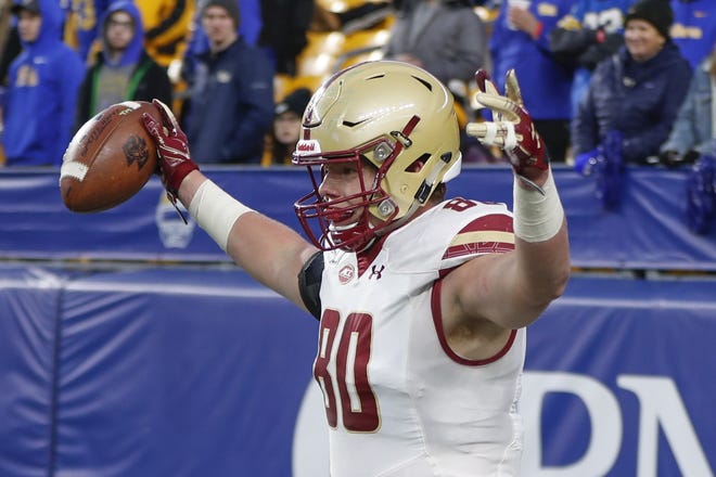 Boston College tight end and former Exeter High School standout Hunter Long (80) celebrates after making a touchdown catch against Pittsburgh during their game on Saturday in Pittsburgh. [Photo by AP]