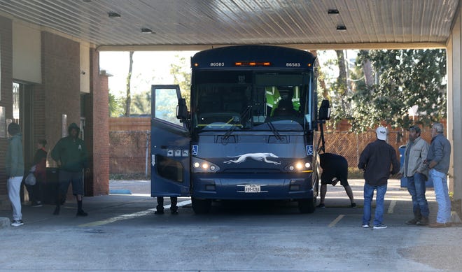 Travelers exit a Greyhound bus on Dec. 3, 2019 in downtown Panama City. [PATTI BLAKE/THE NEWS HERALD]