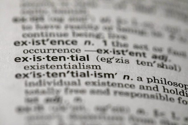 The word "existential" was chosen by Dictionary.com as the word of the year. The choice reflects months of high-stakes threats and crises, real and pondered, across the news, the world and throughout 2019. [AP Photo/Jenny Kane]