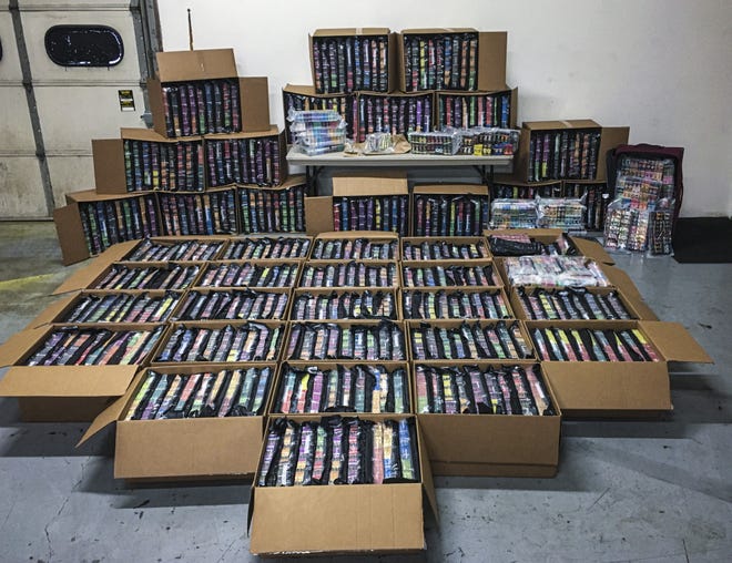 This photo provided Nov. 7, 2019, by the Minnesota Department of Public Safety shows some of the 75,000 THC vaping cartridges seized in drug busts by Minnesota's Northwest Metro Drug Task Force. (Minnesota Department of Public Safety via AP)