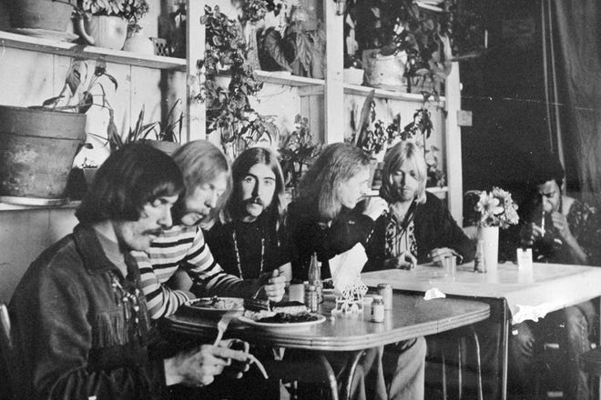 FILE - This undated file photo, shows members of the Allman Brothers Band, from left, Dickey Betts, Duane Allman, Berry Oakley, Butch Trucks, Gregg Allman and Jai Johanny "Jaimoe" Johanson, eating at the H&H Restaurant in downtown Macon, Ga. Capricorn Sound Studios, the Macon, Ga., music studio that fused blues, country and other sounds into Southern rock is being reborn. The historic Studio A is reopening this month, after years of work by Mercer University and other supporters to restore and equip it with state-of-the-art technology. The studio helped propel the Allman Brothers Band and other groups to stardom in the 1970s. (The Macon Telegraph via AP, File)