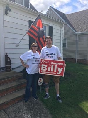 Amanda Billy stands with Kevin Kussmaul as they campaign together this fall for Billy’s run for Parma City Council. Billy did not win. [Amanda Billy]