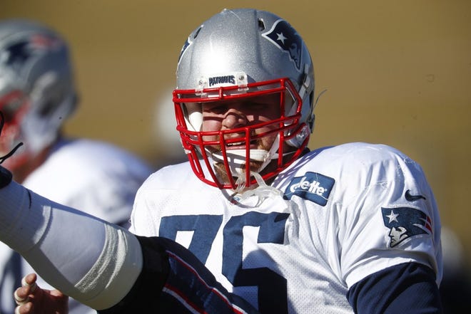 Ted Karras was absent from practice on Wednesday.
