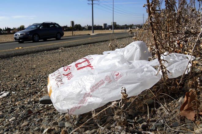 Some Ohio communities are targeting plastic bags for elimination out of environmental concerns. [Rich Pedroncelli/The Associated Press]