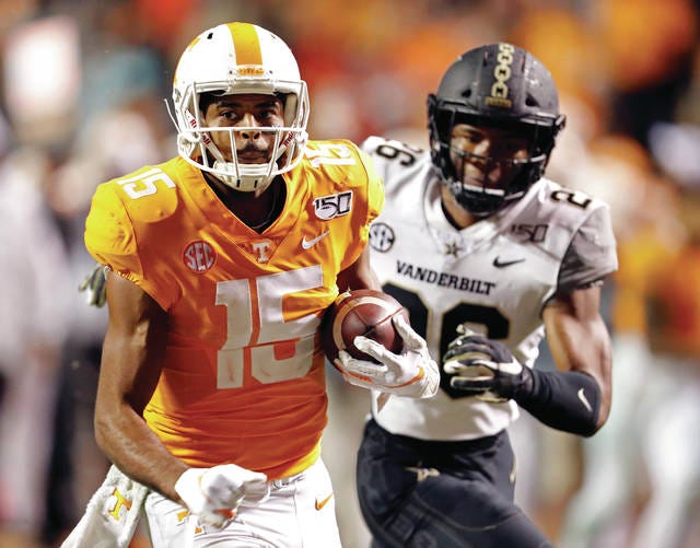 Jauan Jennings (15) will miss the opening half of his team’s bowl game after a video review by the Southeastern Conference determined he committed a flagrant personal foul late in the Vols’ 28-10 win over Vanderbilt. (Wade Payne/The Associated Press)