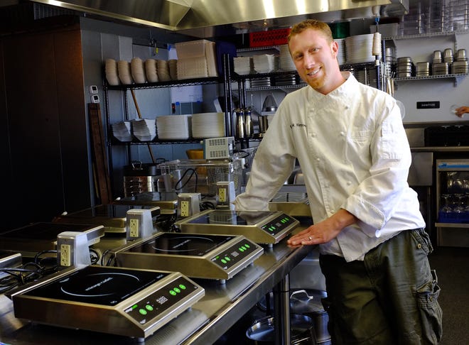 Chef Evan Hennessey of Stages at One Washington in Dover will teach cooking classes Jan. 5 and 12 to benefit the Seacoast Charter School, which his children attend. [File photo by Rich Beauchesne]