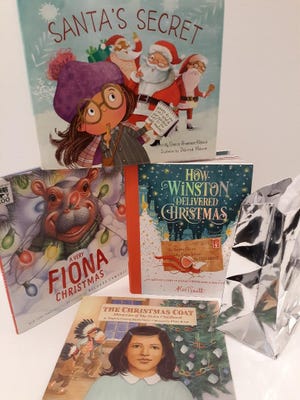 "Santa's Secret," “A Very Fiona Christmas," “The Christmas Coat: Memories of My Sioux Childhood," and “How Winston Delivered Christmas” are four new books for kids this Christmas. [Courtesy Terri Schlichenmeyer]