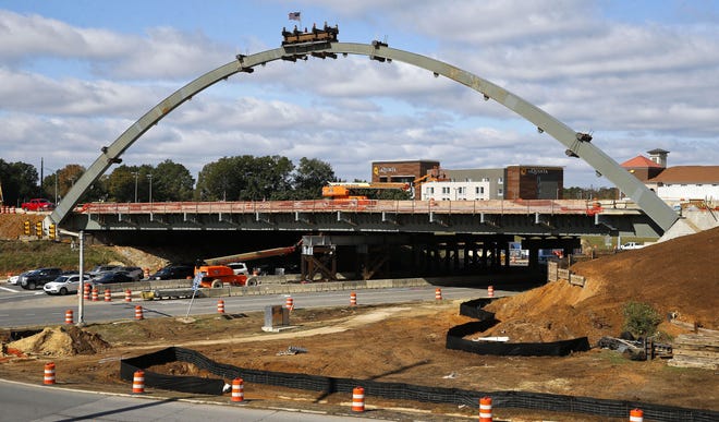 One of the two arches that will define the new overpass on Interstate 20/59 at the McFarland Blvd. exit has been partially erected as seen in this file photo from November. [Staff Photo/Gary Cosby Jr.]