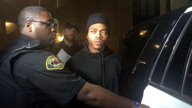 Deandre Luckey apologizes for firing a shot into Central Church of Christ as officers lead him to the Tuscaloosa County Jail late Thursday. [Contributed]