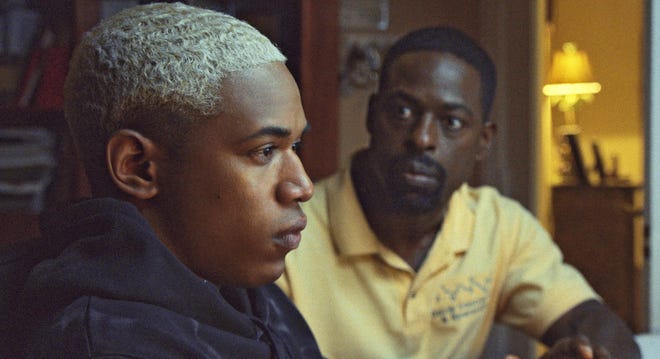 From left, Tyler Williams (Kelvin Harrison Jr.) and his father, Ronald (Sterling K. Brown) in "Waves" [A24]