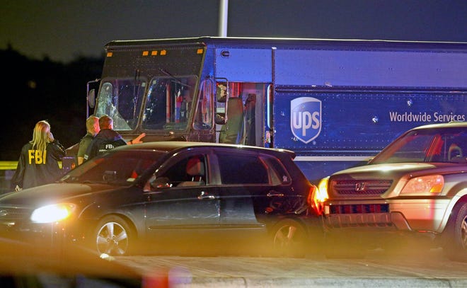 A UPS delivery truck involved in a robbery in Coral Gables that ended in a police shooting Thursday. (Charles Trainor Jr. / Miami Herald / TNS)