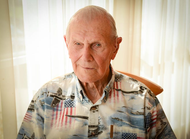 John Schleicher survived the Pearl Harbor bombing because he was in church that Sunday morning. The Nokomis, Florida, resident never talked much about serving during WWII and did not even tell his son, Dick, that he had been at Pearl Harbor until a few days before 73rd anniversary of the attack. He died in 2014. [Sarasota Herald-Tribune staff photo by Rachel S. O'Hara]