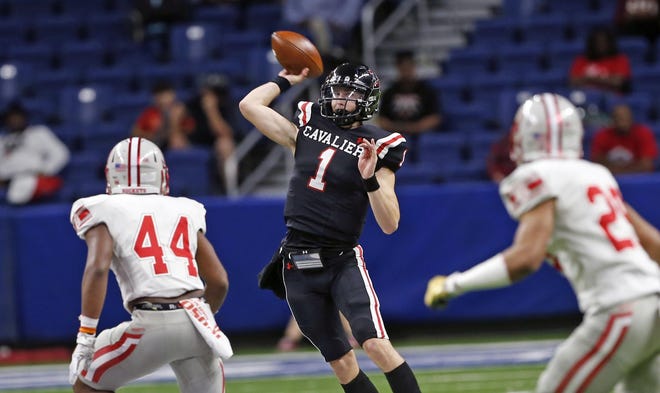 Lake Travis quarterback Hudson Card delivers a pass against Converse Judson in the first half of the Cavs’ 48-35 win Saturday at the Alamodome in San Antonio. [RONALD CORTES/for STATESMAN]