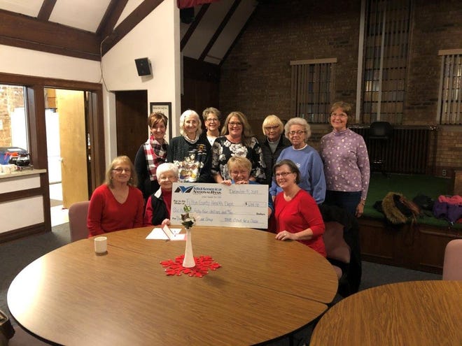 The Breast Cancer Survivor Group in Canton received a donation from MidAmerica National Bank. 

Pictured from the left are: Sandy Mulligan, Nancy Cluts, holding check Sharon Bishop, Janice Sparhakel, 

Back: Angela Blickenstaff, Sharon Ginger, Laura Harris, Candy Hanlin Mid America National Bank, Virginia Vasen, Shirley DeMotte and Diane Sickles. 

Not pictured but they attended the meeting later are Karen Culbertson, and Nancy Leigh. [Courtesy Photo]