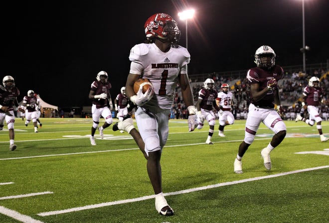 Blountstown running back Treven Smith runs for a 62-yard touchdown in the second half of Saturday night’s 1A state championship game against Madison County at Gene Cox Stadium in Tallahassee. [BRIAN MILLER/TALLAHASSEE DEMOCRAT]