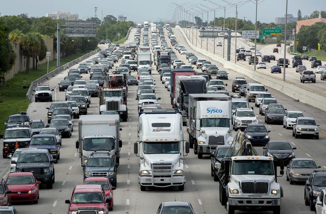 Across Florida there is growing disenchantment with what critics complain is a hidden — and growing — form of taxation: Highway tolls. State motorists are digging deeper into their pockets to travel on roads that were once free. [FILE PHOTO/GANNETT]