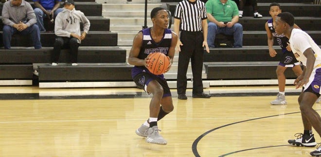 Guard Troy Thomas scored 12 points in Dutchtown's 50-37 win over Denham Springs. Photo by Kyle Riviere.