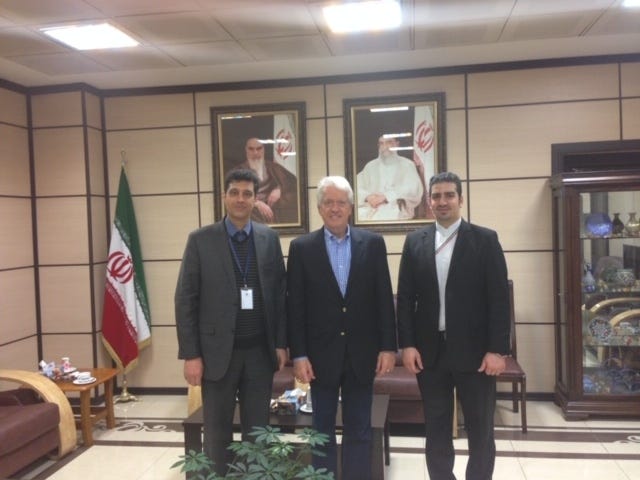 Former Kansas Congressman Jim Slattery, center, said Monday that he assisted with behind-the-scenes communications with Iranian officials to help secure release of Xiyue Wang, a Princeton University graduate student convicted of espionage. The image is of Slattery during a 2014 conference in Tehran. [Submitted]