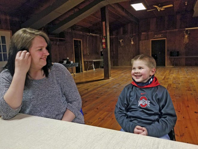 Brantley Milton (right) laughs with his mom, Ariel. Brantley was seriously injured in a late August crash at the intersection of state Route 3 and Hutton Road in Wooster, but is expected to make a full recovery. Jack Rooney, The-Daily-Record.com
