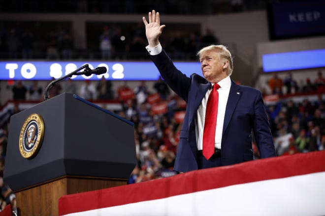 President Donald Trump waves as he speaks at a campaign rally, Tuesday, Dec. 10, 2019, in Hershey, Pa. (AP Photo/Patrick Semansky)
