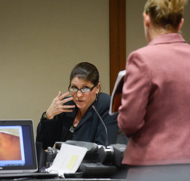 A Venice family is suing Dr. Sally Smith, seen here testifying in a June 2014 murder trial in Sarasota, and Johns Hopkins All Children's Hospital. Maya Kowalski was a patient at All Children's when Smith's accusations led to a court order that prevented her parents from seeing her. Maya's mother committed suicide amid the ordeal. [Herald-Tribune archive / 2014]