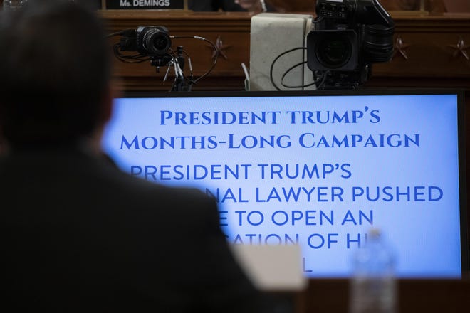A monitor displays a quote as the House Judiciary Committee hears investigative findings in the impeachment inquiry of President Donald Trump, Monday, Dec. 9, 2019, on Capitol Hill in Washington. Anna Moneymaker/Pool via AP)